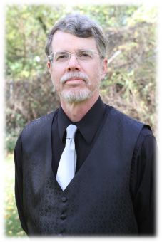 John joined the Kalamazoo Ringers in 2015. He has been playing handbells off and on since 1984. He played French horn in an army band and was a band director before going back to school to start a career as a mechanical engineer. Currently, he works at Conn-Selmer in Elkhart, Indiana, where musical instruments are made. In his spare time he enjoys reading, music, and spending time with his wife and their cats.